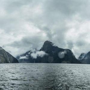 Cloudy and rainy day at amazing and vibrant Milford Sound, South Island, New Zealand